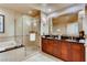 Bathroom with double sinks, shower and bathtub at 125 E Harmon Ave # 2816, Las Vegas, NV 89109