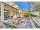 Patio with seating area and view of house and landscaping at 1259 Moon Vision St, Henderson, NV 89052