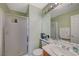 Clean bathroom with shower stall, vanity, and mirrored medicine cabinet at 1259 Moon Vision St, Henderson, NV 89052