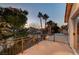 Evening view from private deck overlooking backyard with lush landscaping at 1259 Moon Vision St, Henderson, NV 89052