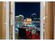 Private balcony with city views at night at 145 E Harmon Ave # 2215, Las Vegas, NV 89109