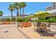 Charming courtyard with seating and string lights at 145 E Harmon Ave # 2215, Las Vegas, NV 89109