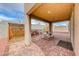 Covered patio with brick pavers and seating area at 1556 Bryce Canyon St, Boulder City, NV 89005