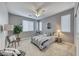 Serene bedroom with ample natural light and a stylish seating area at 1556 Bryce Canyon St, Boulder City, NV 89005