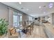 Open dining room with large wooden table and kitchen views at 1556 Bryce Canyon St, Boulder City, NV 89005