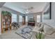 Spacious living room with a piano and built-in shelving at 1556 Bryce Canyon St, Boulder City, NV 89005