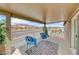 Covered patio with mountain views and comfy seating at 1556 Bryce Canyon St, Boulder City, NV 89005