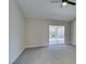 Bright bedroom with carpet, ceiling fan, and sliding glass door to pool at 160 Swale Ln, Las Vegas, NV 89144