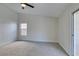 Well-lit bedroom with carpet, ceiling fan and window at 160 Swale Ln, Las Vegas, NV 89144