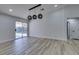 Bright dining room features hardwood floors and sliding glass doors to backyard at 160 Swale Ln, Las Vegas, NV 89144