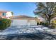 Single story home with a three car garage and mature tree at 160 Swale Ln, Las Vegas, NV 89144