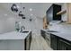 Modern kitchen with light wood and dark cabinetry at 160 Swale Ln, Las Vegas, NV 89144