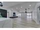 Spacious living room with modern fireplace and hardwood flooring at 160 Swale Ln, Las Vegas, NV 89144