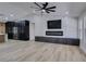 Spacious living room featuring a marble fireplace and ceiling fan at 160 Swale Ln, Las Vegas, NV 89144