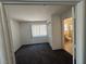 Bright bedroom with carpet flooring and access to bathroom at 1762 Sunflower Ct, Henderson, NV 89074