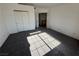 Bedroom with double doors to closet and carpet at 1762 Sunflower Ct, Henderson, NV 89074