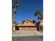 Two-story house with three-car garage and desert landscaping at 1762 Sunflower Ct, Henderson, NV 89074