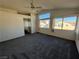 Main bedroom features a ceiling fan and view of neighborhood at 1762 Sunflower Ct, Henderson, NV 89074