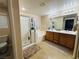 Large bathroom with double sinks, soaking tub, and separate shower at 1908 W Hammer Ln, North Las Vegas, NV 89031