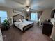 Spacious primary bedroom with plush carpet and large bed at 1908 W Hammer Ln, North Las Vegas, NV 89031