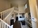 Two-story entryway with hardwood floors and a staircase at 1908 W Hammer Ln, North Las Vegas, NV 89031