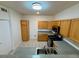 Well-equipped kitchen featuring stainless steel appliances and tile flooring at 2001 Jasper Bluff St # 102, Las Vegas, NV 89117