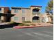 Two-story building with parking and landscaping at 2101 Blue Breeze Dr # 104, Las Vegas, NV 89128