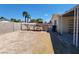 Large backyard with a covered patio and storage shed at 2102 E Russell Rd, Las Vegas, NV 89119