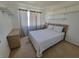 Bedroom with double bed, light wood furniture, and built-in shelves at 2102 E Russell Rd, Las Vegas, NV 89119