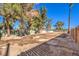 Large backyard with mature trees and ample space at 2500 W Oakey Blvd, Las Vegas, NV 89102