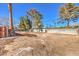 Spacious backyard with mature trees and open area at 2500 W Oakey Blvd, Las Vegas, NV 89102