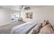 Main bedroom with large bed, sitting area, and access to patio at 2500 W Oakey Blvd, Las Vegas, NV 89102