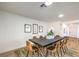 Bright dining room features a large table with brown leather chairs at 2500 W Oakey Blvd, Las Vegas, NV 89102