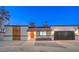 Updated single-story home with a modern facade and a two-car garage at 2500 W Oakey Blvd, Las Vegas, NV 89102