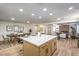 Open concept kitchen with island and view into living room at 2500 W Oakey Blvd, Las Vegas, NV 89102