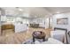 Modern kitchen with island, light wood cabinets, and stainless steel appliances at 2500 W Oakey Blvd, Las Vegas, NV 89102