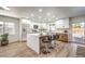 Modern kitchen featuring white cabinets, an island, and stainless steel appliances at 2500 W Oakey Blvd, Las Vegas, NV 89102