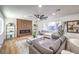 Bright living room with wood fireplace, light walls, and hardwood floors at 2500 W Oakey Blvd, Las Vegas, NV 89102