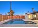 Sparkling clean rectangular pool with a large patio and lounge chair at 2500 W Oakey Blvd, Las Vegas, NV 89102