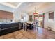 Bright dining area with a marble table and access to the backyard at 2781 Sandyfalls Way, Las Vegas, NV 89142