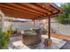 Enjoy a relaxing soak in this private hot tub under a pergola at 2781 Sandyfalls Way, Las Vegas, NV 89142