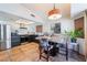 Modern kitchen with stainless steel appliances and dark cabinetry at 2781 Sandyfalls Way, Las Vegas, NV 89142