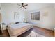 Spacious bedroom with a platform bed and hardwood floors at 2781 Sandyfalls Way, Las Vegas, NV 89142