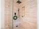 Spa-like shower with niche shelving and modern fixtures at 2781 Sandyfalls Way, Las Vegas, NV 89142