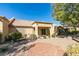 Rear view of house, showing patio and landscaping at 2856 Billy Casper Dr, Las Vegas, NV 89134