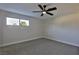 Bedroom with ceiling fan, neutral paint, carpet and window at 3225 Crawford St, North Las Vegas, NV 89030