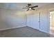 Spacious bedroom with plush carpeting and large closet at 3225 Crawford St, North Las Vegas, NV 89030