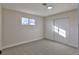 Bright bedroom with neutral wall paint, carpet flooring and sliding door closet at 3225 Crawford St, North Las Vegas, NV 89030