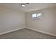 Bright bedroom with neutral wall paint, carpet flooring and a window at 3225 Crawford St, North Las Vegas, NV 89030