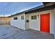 Modern exterior with bright red front door at 3225 Crawford St, North Las Vegas, NV 89030